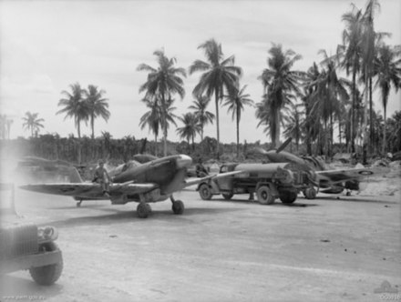 A No. 79 Squadron Spitfire Mk. VC and ground crew at Momote Airfield in April 1944