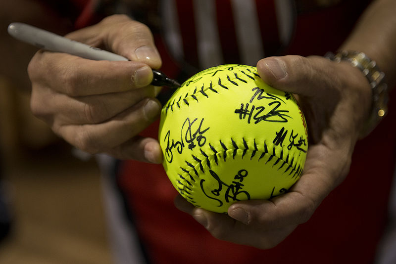 File:A member of the Wounded Warrior Amputee Softball Team autographs a softball for U.S. Air Force Airman Ken Oliver, with the 15th Maintenance Squadron 130108-F-ZB240-324.jpg