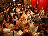 Archbishop Ezzati greets the faithful.