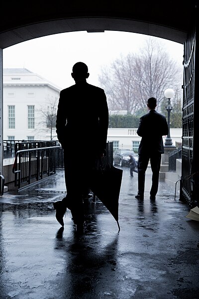 File:Barack Obama keeps dry.jpg