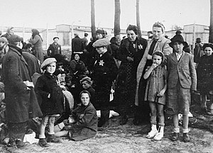 Birkenau Jewish women and children waiting in a grove near gas chamber no 4 prior to their extermination.jpg
