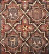 Cour Henri IV, blasons sous l'auvent. Les motifs géométriques évoquent le style mudéjar mais aussi des gravures de Serlio.