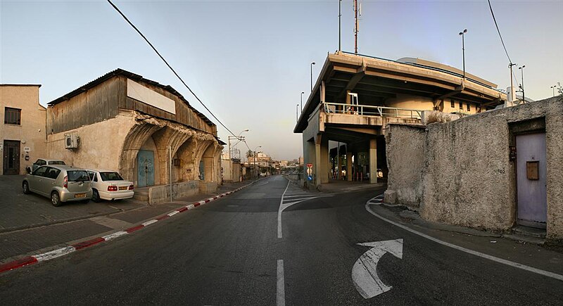 File:Broken well-house and the Tel Aviv Central Bus Station.jpg