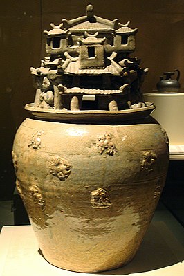 A celadon hunping jar with sculpted designs of architecture, from the Jin dynasty (266–420)