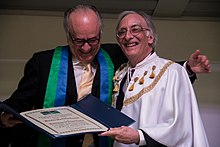 Sousa Santos (left) being awarded a doctorate honoris causa by the University of Brasilia, in Brazil, 2012. Cerimonia Honoris Causa Boaventura de Sousa Santo (8142296434).jpg