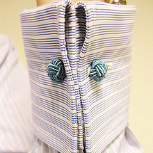 This French cuff is fastened with silk knots. Charvet cuff.jpg