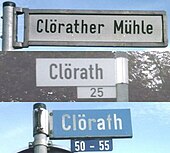 Eine Ortschaft in 3 Städten:Auf wessen Gebiet man sich gerade befindet, erkennt man in Clörath im Zweifelsfall am Design der Straßenschilder. Die obige Abbildung zeigt, von oben nach unten, je ein Viersener, ein Willicher und ein Tönisvorster Straßenschild.