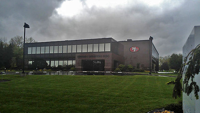 The headquarters of The DeBartolo Corporation in Boardman, Ohio, with the 49ers logo on the building, signifying the team's ownership by the Youngstow