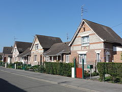Des habitations groupées par cinq dans la cité-jardin.