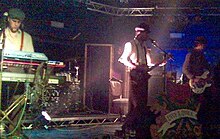Envy & Other Sins performing in February 2006 (l-r: Jarvey Moss, Ali M. Forbes, Mark E. Lees)