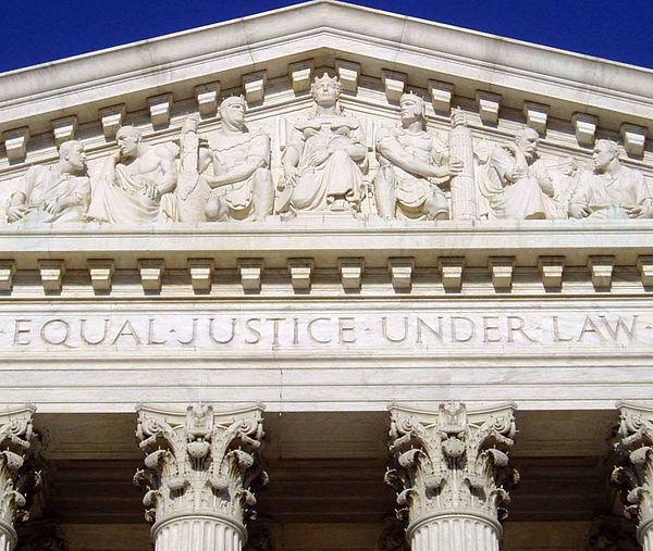 The U.S. Supreme Court Building opened in 1935, inscribed with the words "Equal Justice Under Law" which were inspired by the Equal Protection Clause.