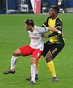 Хичан на утакмици против Борусије Дортмунд у Лиги Европе 2018. године.