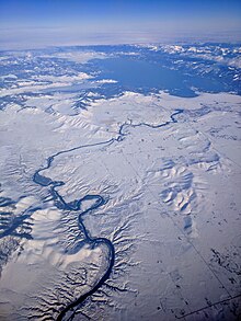 Winter aerial view of the Flathead River below Kerr Dam (below Flathead Lake)