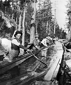 Flume herders used a metal-tipped wood handling tool called a pickaroon.