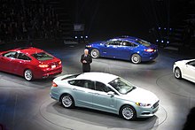 The 2013 Ford Fusion line-up, including the Fusion hybrid and plug-in variants, won the 2013 Green Car of the Year. Ford Fusion at NAIAS 2012 003.jpg