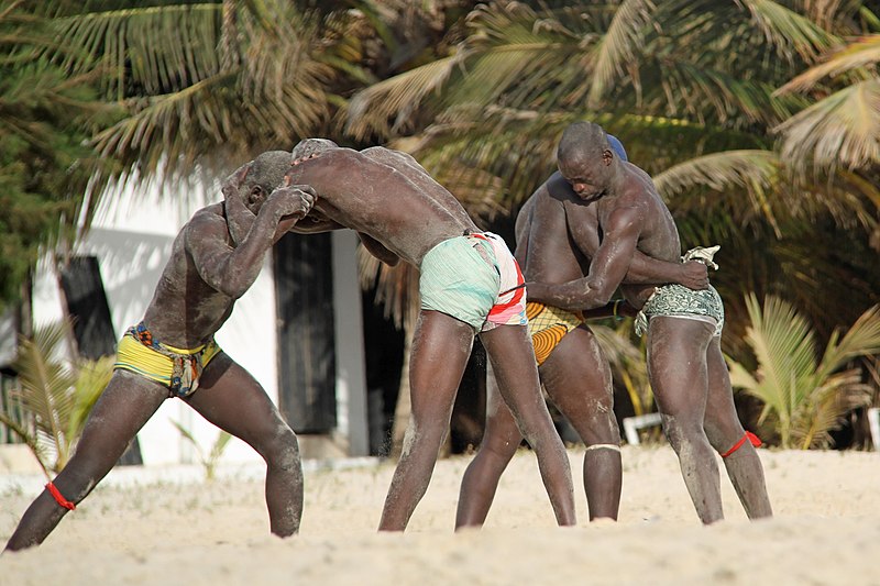 File:Gambian wrestlers on the beach (11135266145).jpg