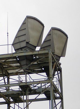 C band horn-reflector antennas on the roof of a telephone switching center in Seattle, Washington, part of the U.S. AT&T Long Lines microwave relay network. Hogg horn antennas.jpg