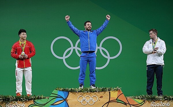 Medalists in the weightlifting men's 85 kg event. Iranian Kianoush Rostami won the competition