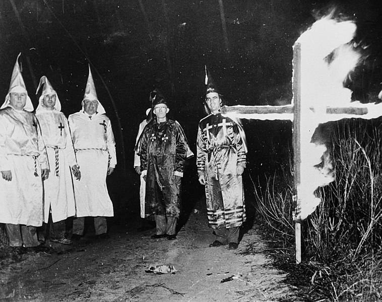 File:Klansmen in robes with burning cross (State's Exhibit No.4). The photographer for this shot is not listed or known, and it is likely that this photo was taken at a Klan cross burning in earlyJanuary (8223346951).jpg