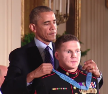 Carpenter receiving the Medal of Honor from President Barack Obama, June 19, 2014 KyleCarpenter19m04sVideoFrame.png