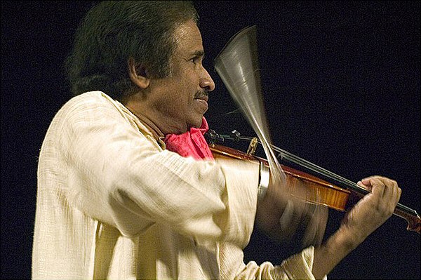 Subramaniam performing at a concert in 2003