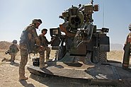 Preparing to load the breech in Afghanistan, August 2009.