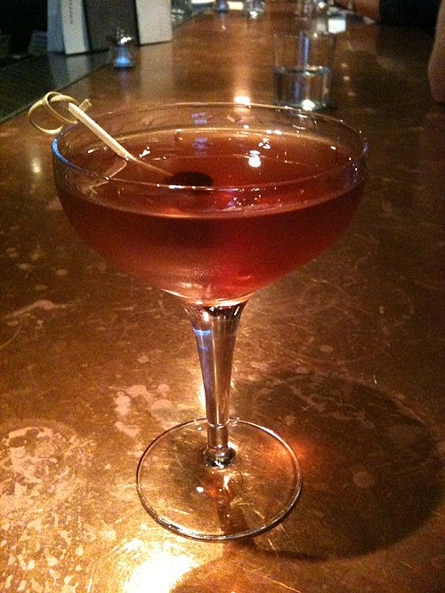 A Manhattan served in a champagne coupe