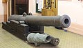 Cannon in Port Elizabeth museum that was preserved under sea-water for 300 years as a result of resting on a pair of cast-iron cannon.