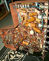 Underside of the chassis of a 1948 Motorola VT-71 7" television, showing the complexity of the point to point wiring. Motorolagoldenviewchassis.jpg