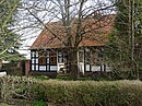 Courtyard with residential house, two stable buildings and front garden