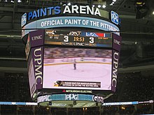 The scoreboard of PPG Paints Arena in Pittsburgh, PA during a Penguins vs. Rangers game in 2019. PPG Paints Arena Scoreboard.jpg