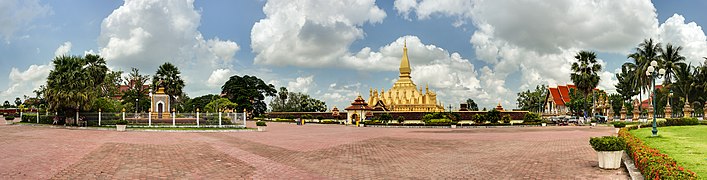 Pha That Luang stupa (center) and statue of king Setthathirat (left), Vientiane