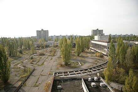 The central square of Pripyat as of 2008. In 22 years, vegetation had grown through the concrete.