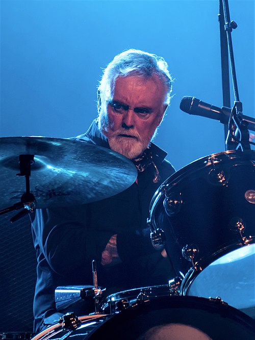 Taylor performing with Queen + Adam Lambert in December 2017