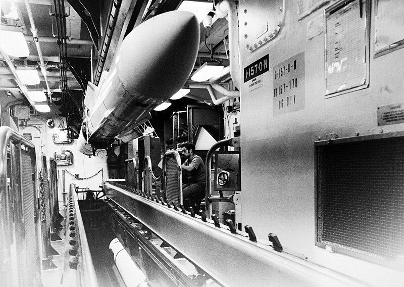 File:RIM-67 Standard missiles are loaded on the missile house rail aboard USS Mahan (DDG-42) on 1 March 1983 (6370831).jpg