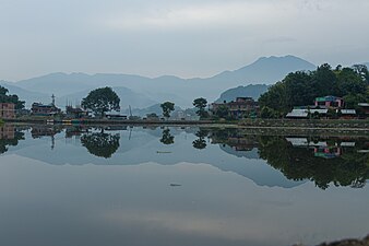 Reflection on a cloudy morning at Nagdaha.jpg