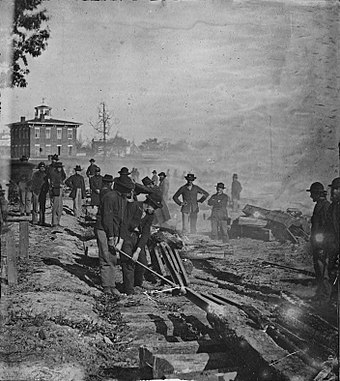 Sherman's army destroying rail infrastructure in Atlanta, 1864
