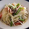 Som tam pu, a Thai green papaya salad with brined rice paddy crabs