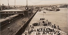 HMS King George V Battleship docked at Station Pier in 1945. Station pier melbourne.jpg