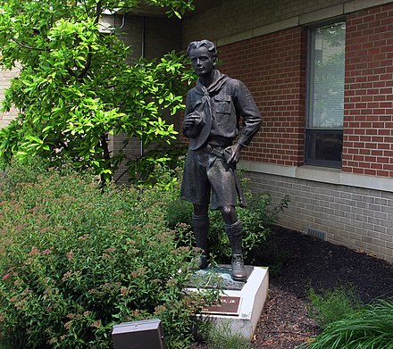 Statue of a Boy Scout in uniform. The Scout uniform is a specific characteristic of scouting used in most of their events.