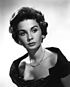 Promotional photograph of Jean Simmons looking to the right in 1955