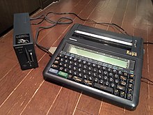 Toshiba Rupo JW-P22(K)(March 1986) and an optional micro floppy disk drive unit JW-F201 TOSHIBA JW-P22.jpg