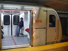 Subway doors on Line 2 are operated by a train guard, situated in the trailing operator cab. TTC 5416 at Union a.JPG