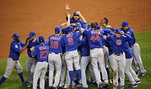 The Cubs celebrate after winning the 2016 World Series. The Cubs celebrate after winning the 2016 World Series. (30709972906).jpg