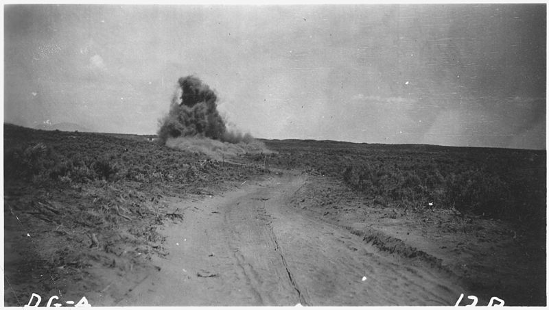 File:Truck trails. The drilling and blasting crew is following the work of the clearing crew. - NARA - 298348.jpg