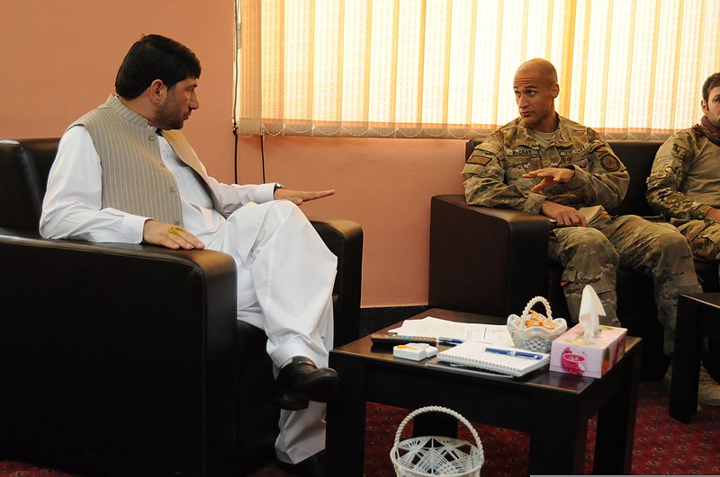 File:U.S. Navy Cmdr. Louis McCray, center, the commanding officer of the Farah Provincial Reconstruction Team (PRT), talks with Farah provincial Gov 130522-N-LR347-087.jpg