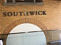 English: When the Southwick Elevator was constructed, the original facade was maintained inside.