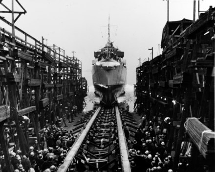 Destroyer USS Johnston (DD-557) slipping into the water stern-first during her launch from the Seattle-Tacoma Shipbuilding Corporation shipyard on 25 March 1943