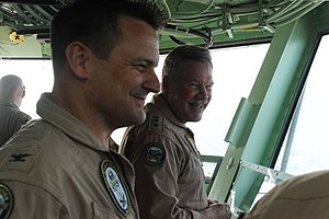 US Navy 120114-N-EK905-013 Capt. Jim Landers, commanding officer of the amphibious assault ship USS Makin Island (LHD 8), left, gives Vice Adm. Mar.jpg