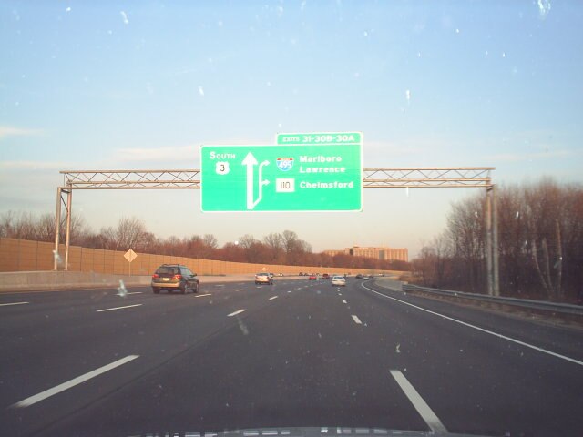 Signage on US Route 3, approaching the intersection with Interstate 495 and Massachusetts Route 110 in Chelmsford
